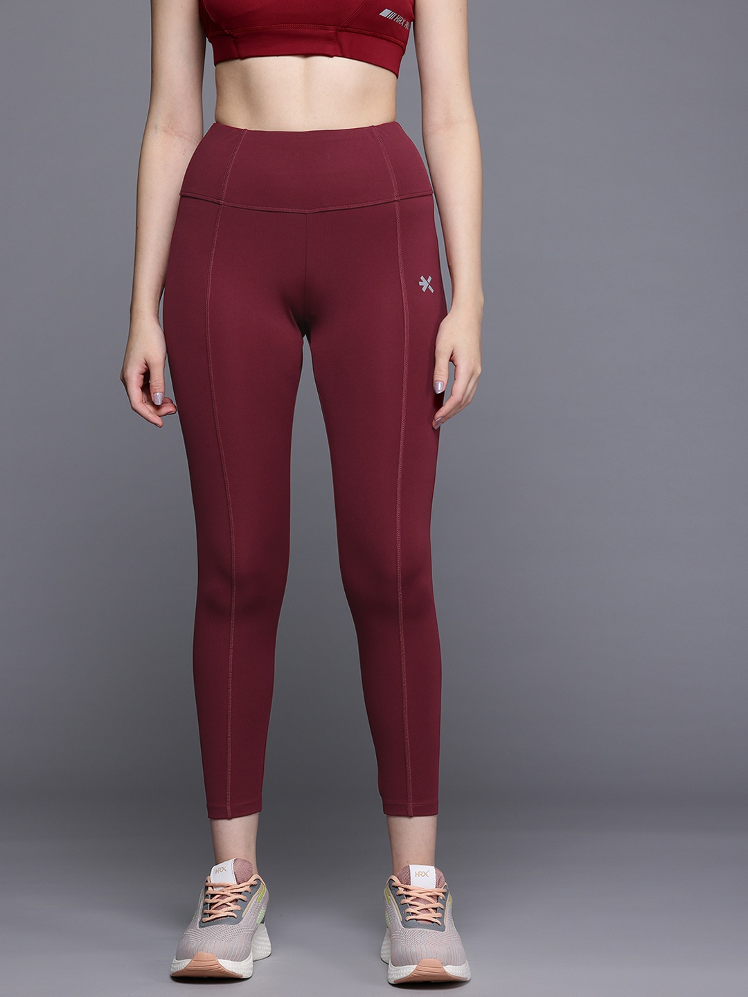 

HRX by Hrithik Roshan Women Solid Running Graphic Leggings, Maroon