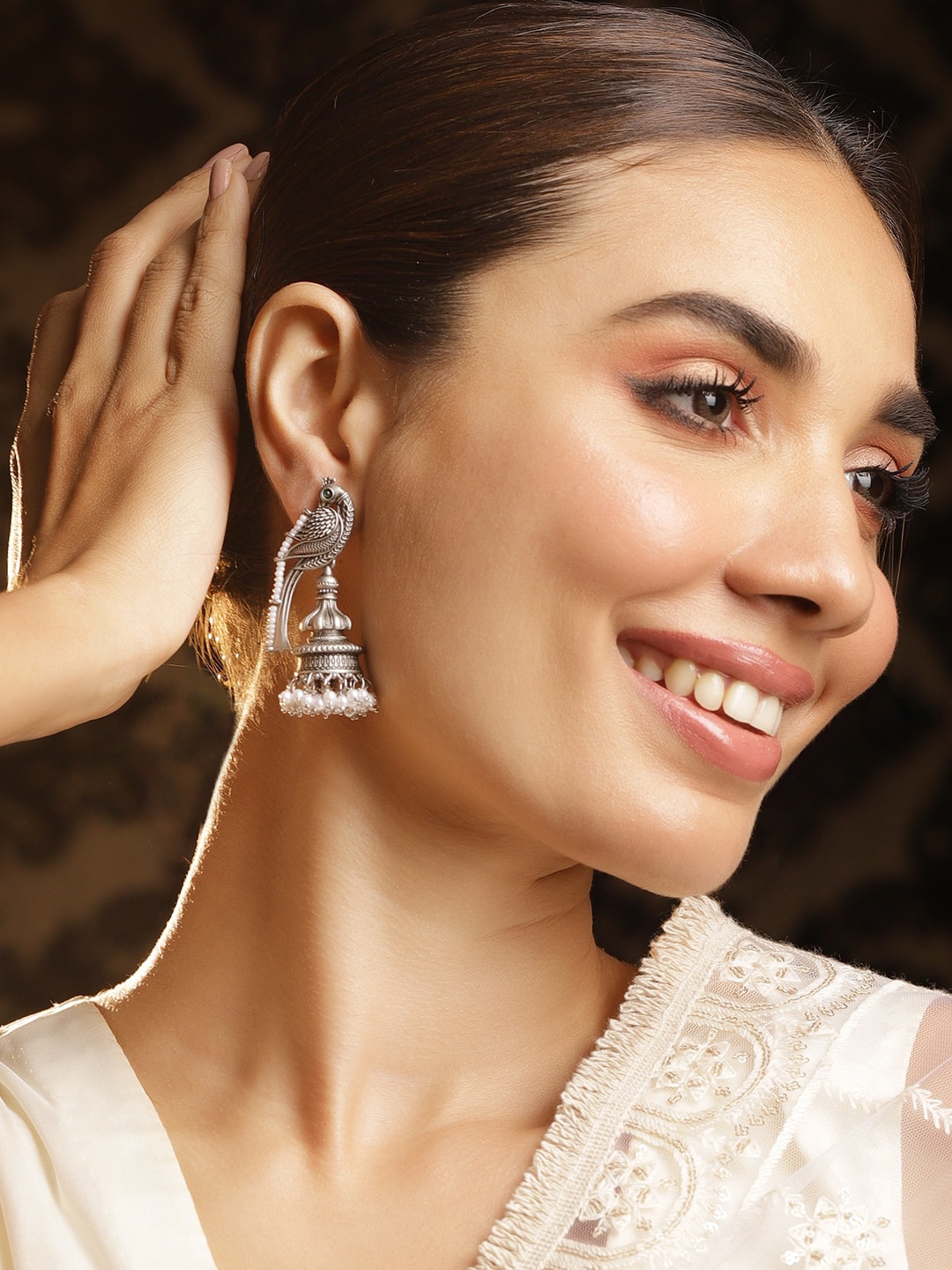 

Rubans Silver-Plated Beads Beaded Peacock Shaped Oxidised Jhumkas