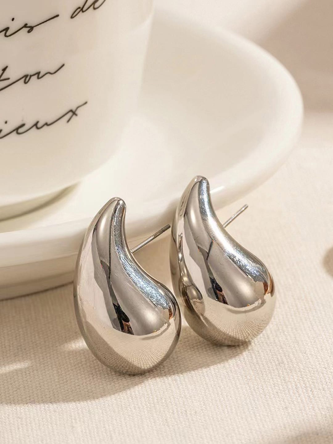 

Jewels Galaxy Silver Plated Stud Earrings
