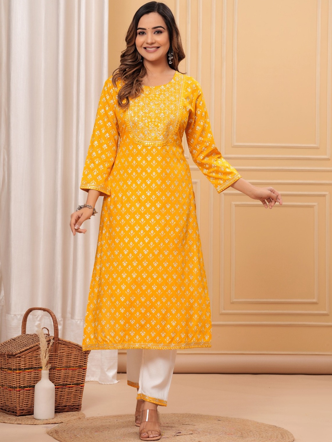 

DHROOV TARA Ethnic Motifs Printed Mirror Work Straight Kurta with Trouser, Yellow