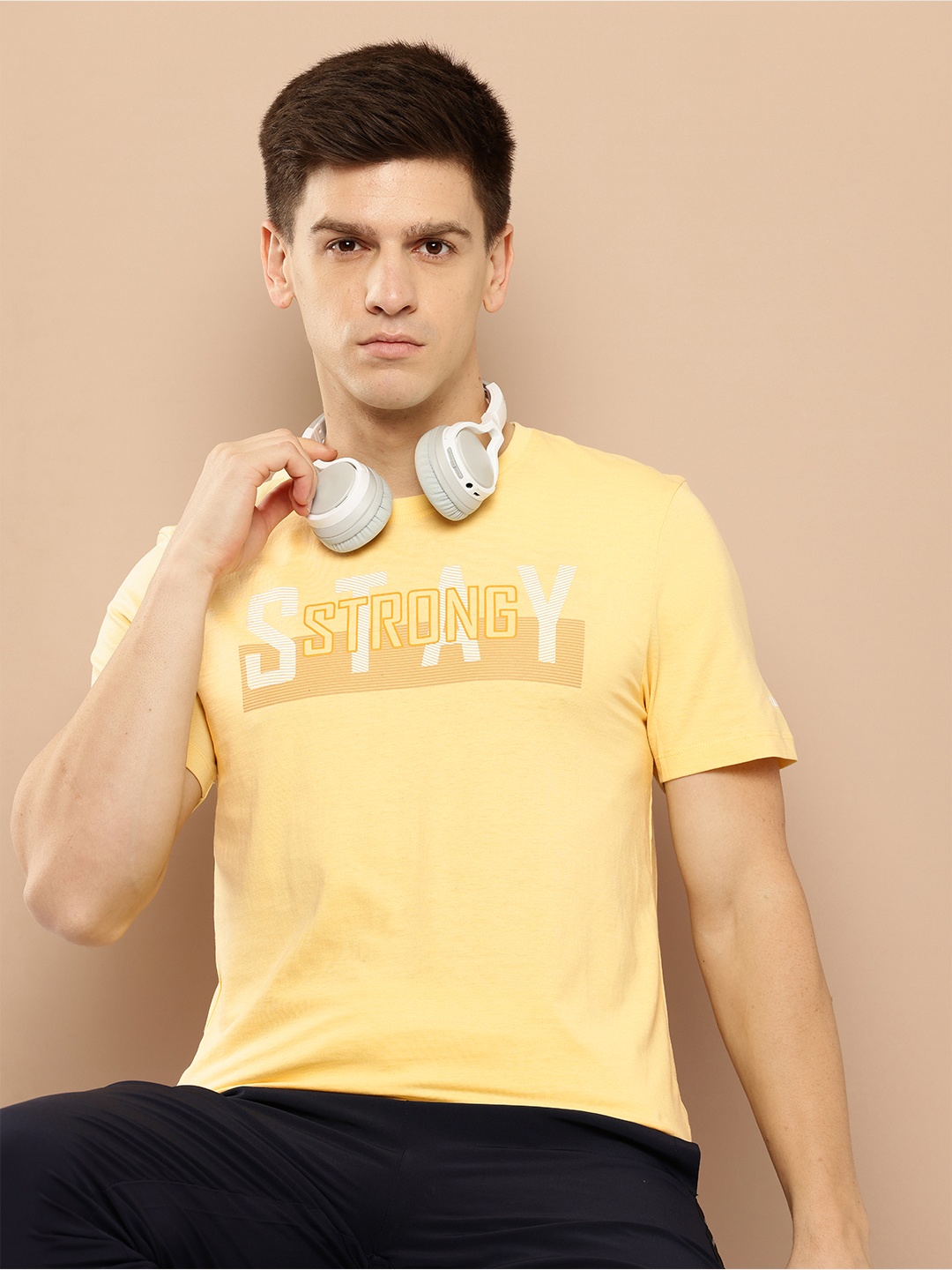 

Alcis Typography Printed Anti Static Slim Fit Sports T-shirt, Yellow