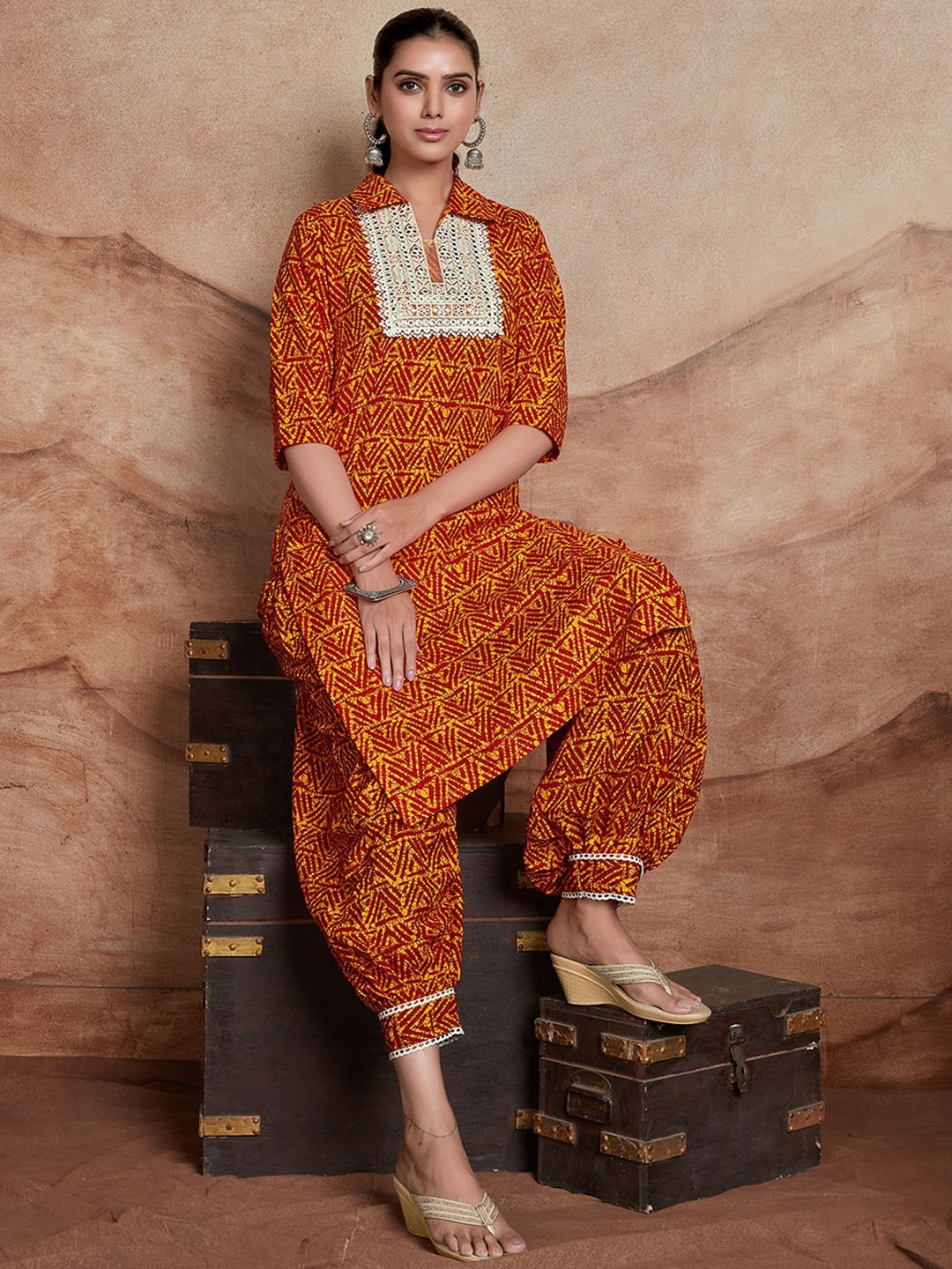 

KALINI Ethnic Motifs Printed Mirror Work Kurta with Salwar, Orange