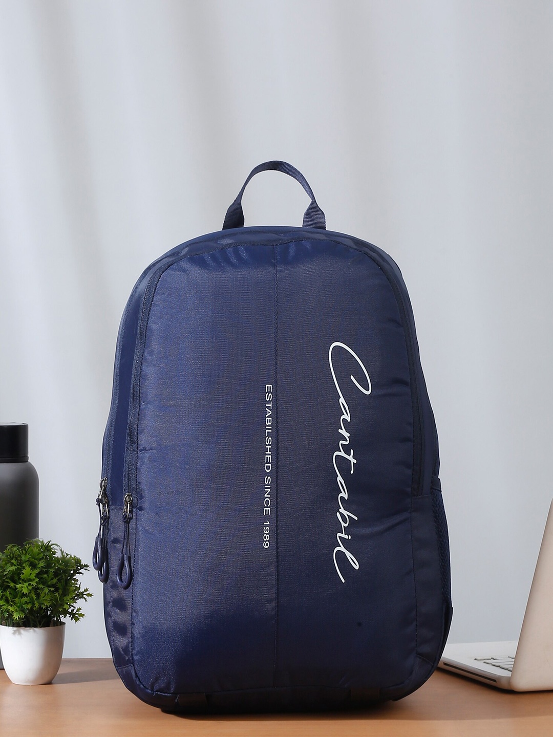 

Cantabil Unisex Typography Printed Backpack, Navy blue