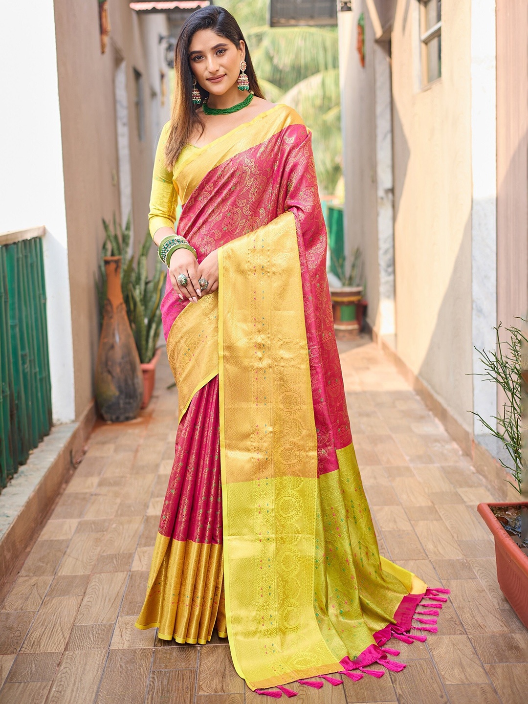 

Anouk Pink Ethnic Motifs Woven Design Zari Silk Blend Kanjeevaram Saree