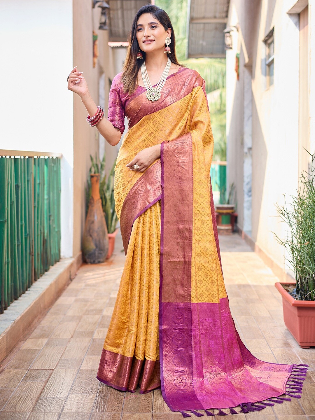 

Anouk Mustard Ethnic Motifs Woven Design Zari Silk Blend Kanjeevaram Saree