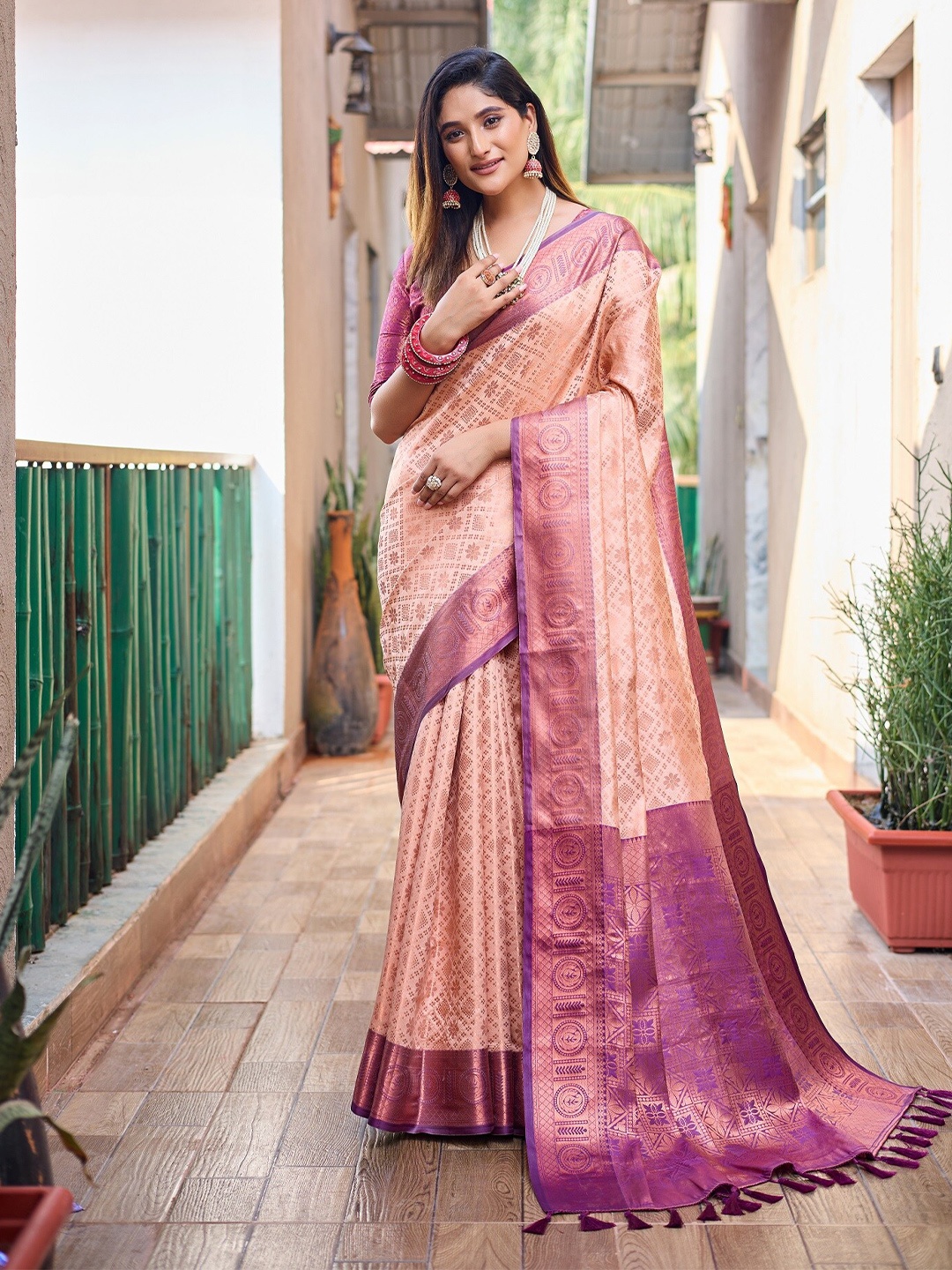 

Anouk Peach Ethnic Motifs Woven Design Zari Kanjeevaram Saree