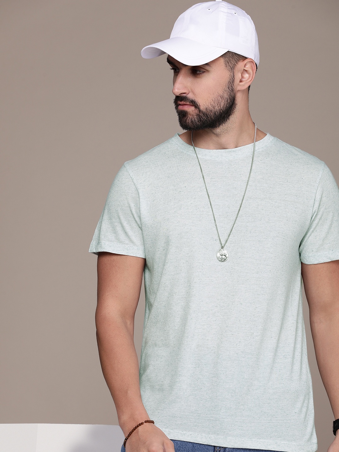 

Roadster Men Solid T-shirt, Green