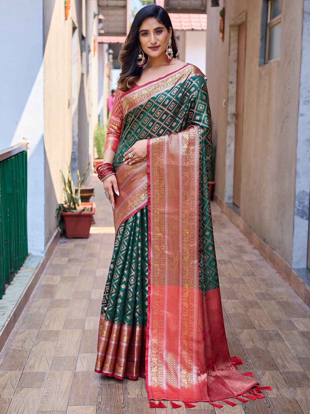 

Anouk Green Ethnic Motifs Woven Design Zari Silk Blend Kanjeevaram Saree