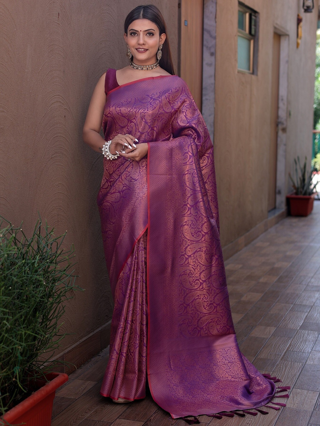 

Anouk Burgundy Ethnic Motifs Woven Design Zari Silk Blend Kanjeevaram Saree