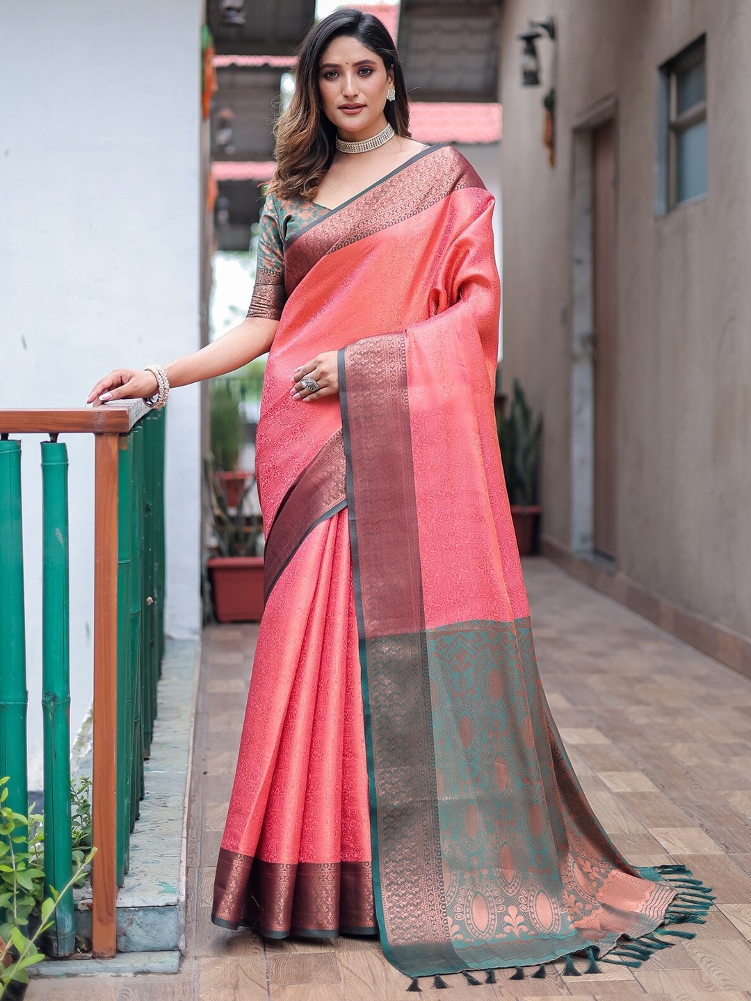 

Anouk Peach Ethnic Motifs Woven Design Zari Silk Blend Kanjeevaram Saree