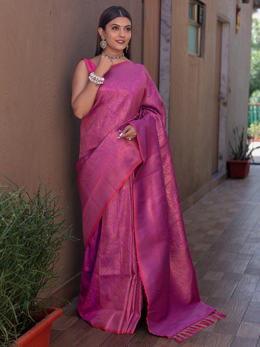

Anouk Pink Ethnic Motifs Woven Design Zari Silk Blend Kanjeevaram Saree