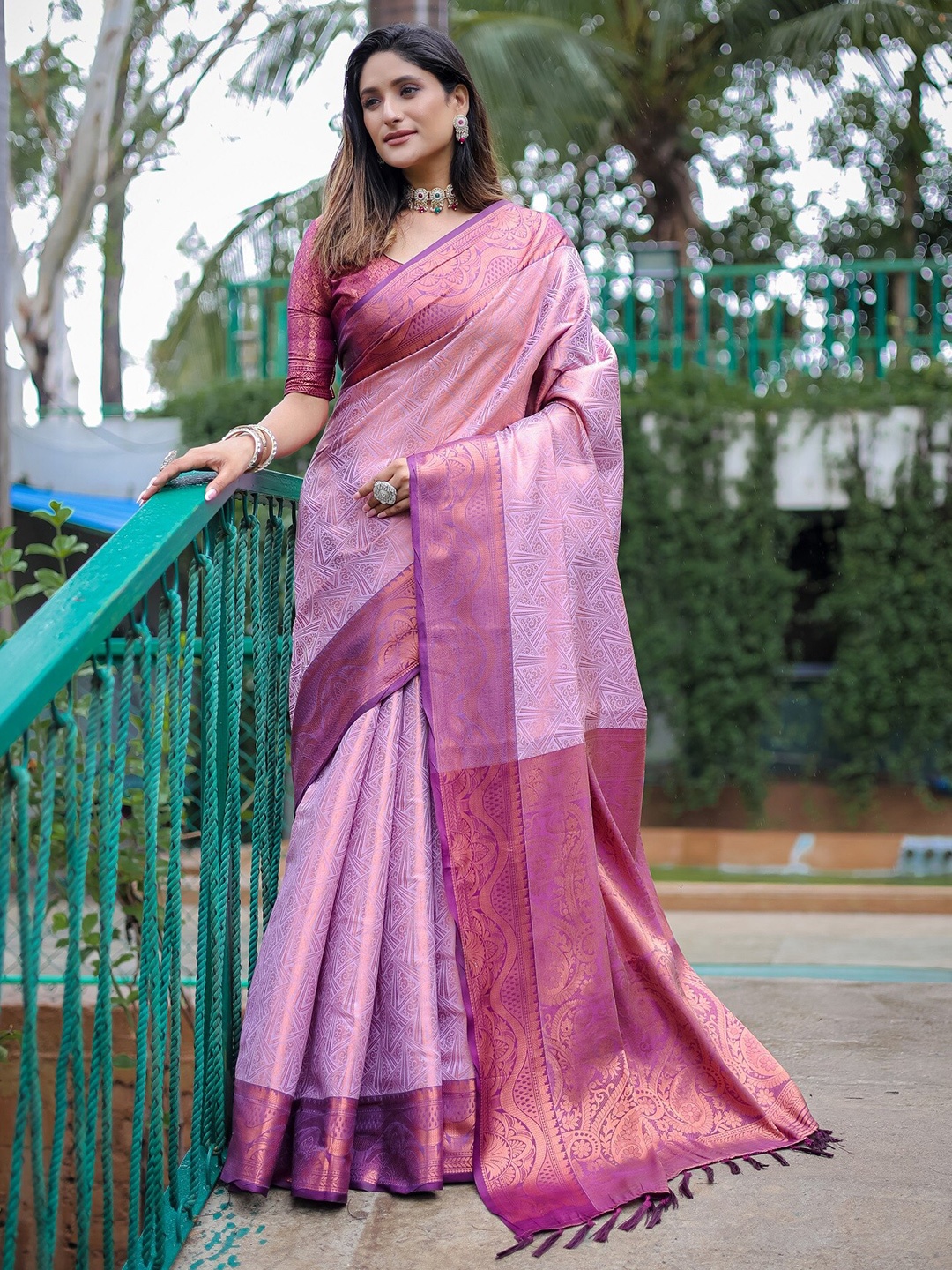 

Anouk lavender Ethnic Motifs Woven Design Zari Silk Blend Kanjeevaram Saree