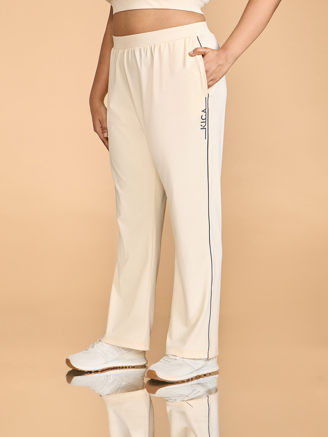 

KICA Women Printed Straight Fit Mid Rise Track Pants, Off white