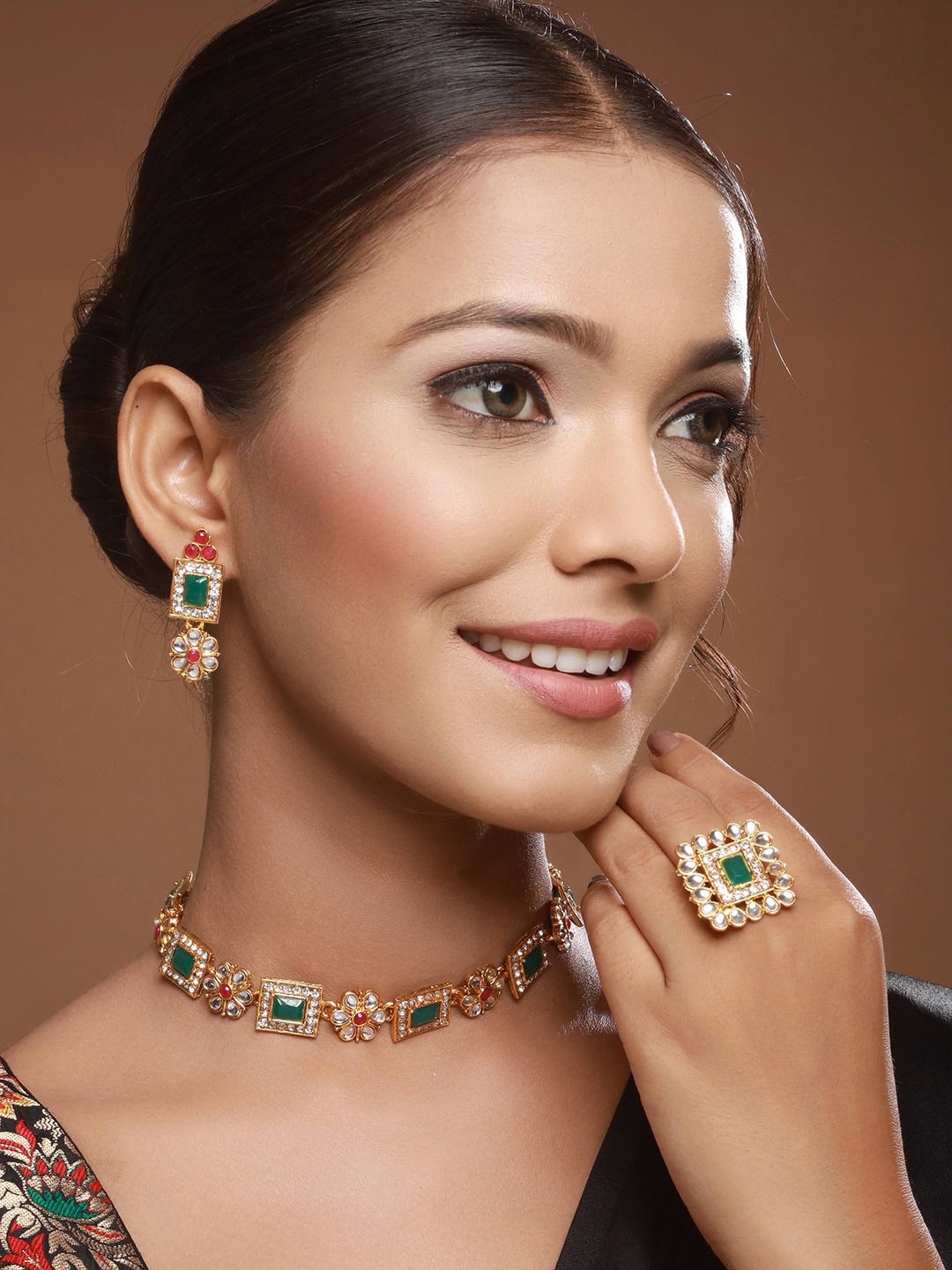 

Anouk Gold Plated Kundan Studded Temple Jewellery Set
