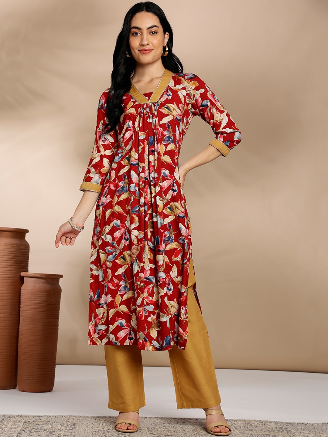 

Anouk Red Floral Printed A-line Kurta with Palazzos