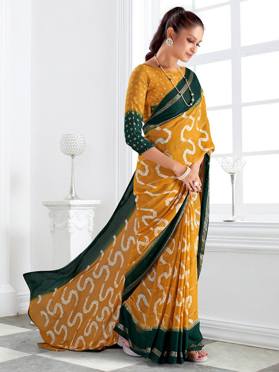 

Mitera Ethnic Motifs Printed Zari Pure Georgette Bagru Saree, Yellow