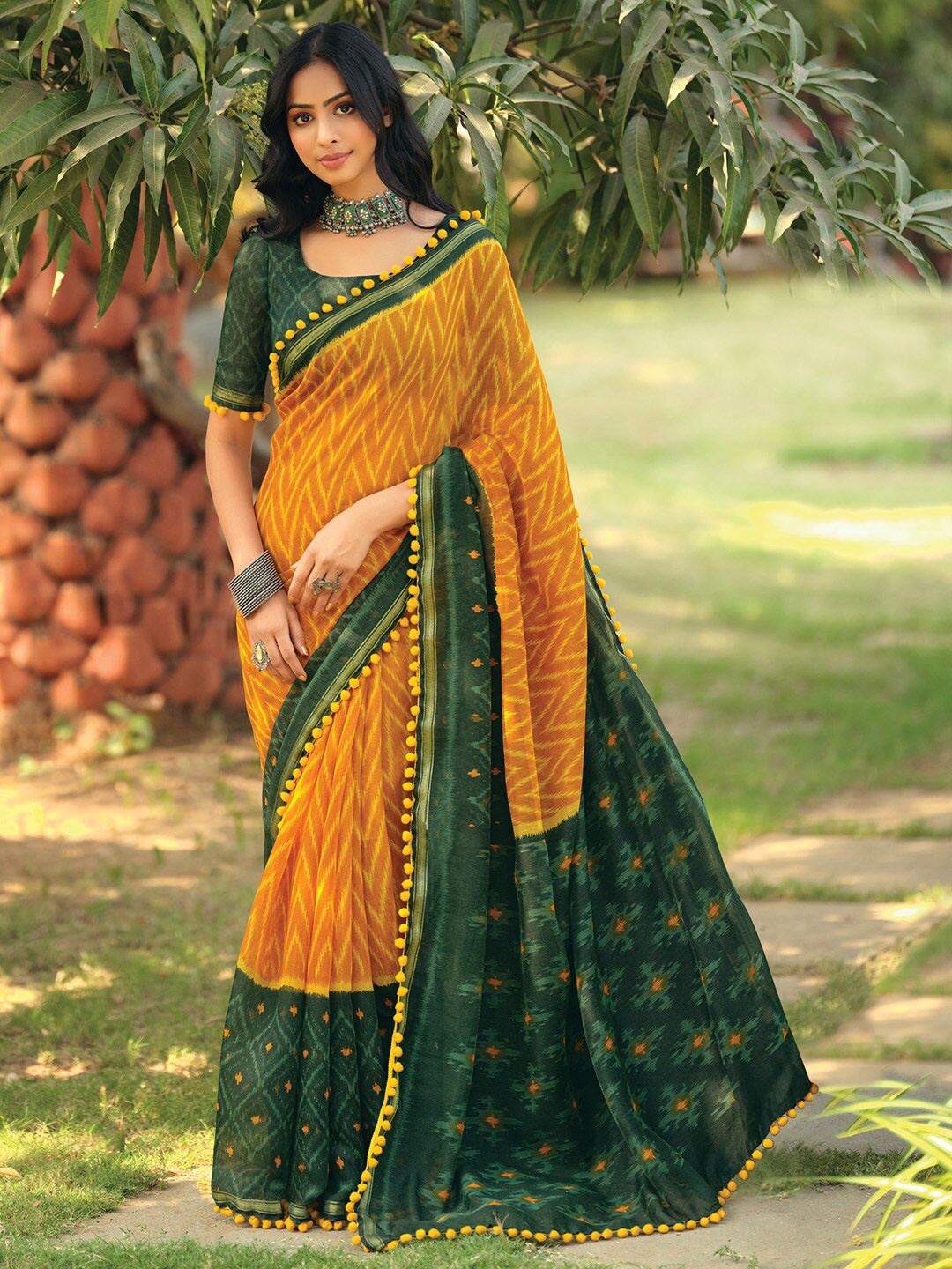 

Saree mall Geometric Printed Ikat Sarees, Mustard