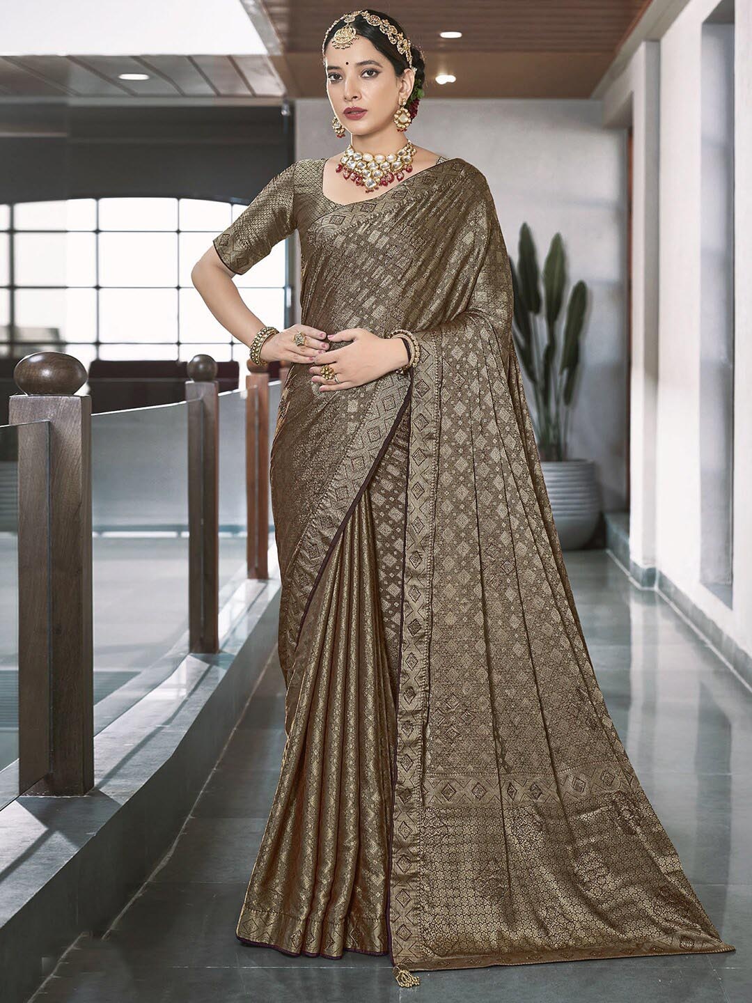 

Satrani Rust Ethnic Motifs Woven Design Zari Saree