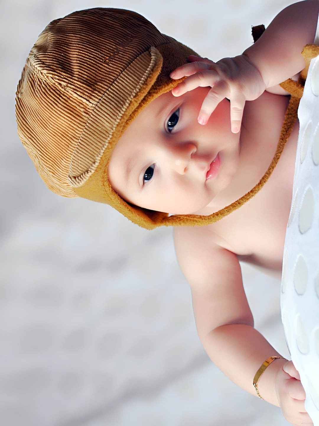 

Wallpics White & Camel Brown Baby Printed Waterproof Wallpaper
