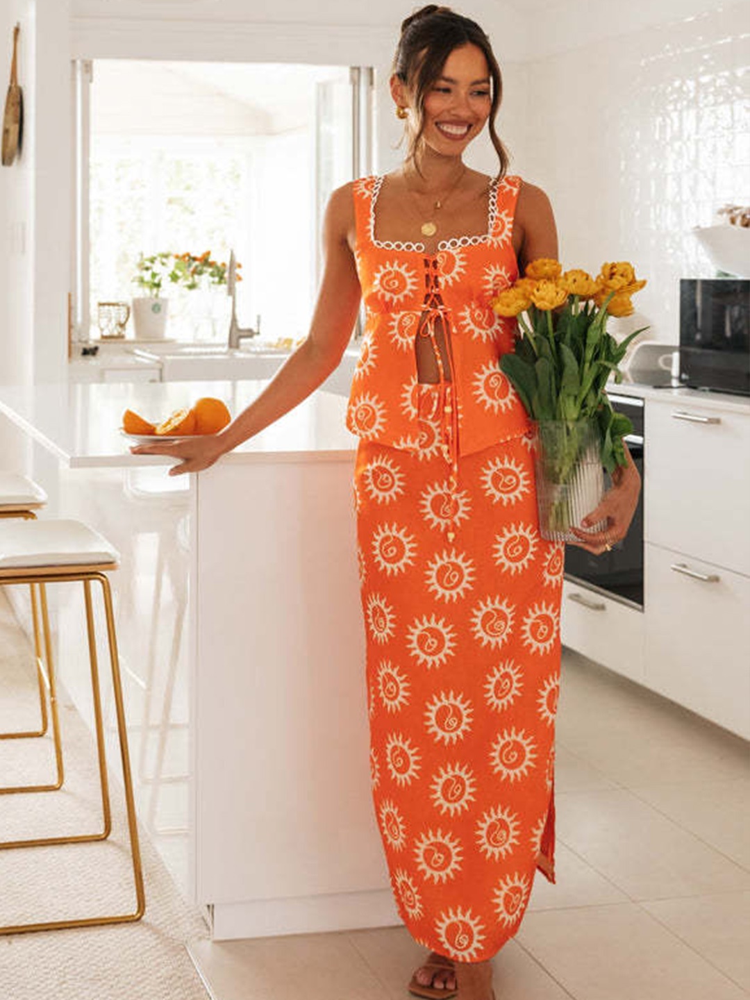 

StyleCast Orange Printed Sleeveless Top With Skirt