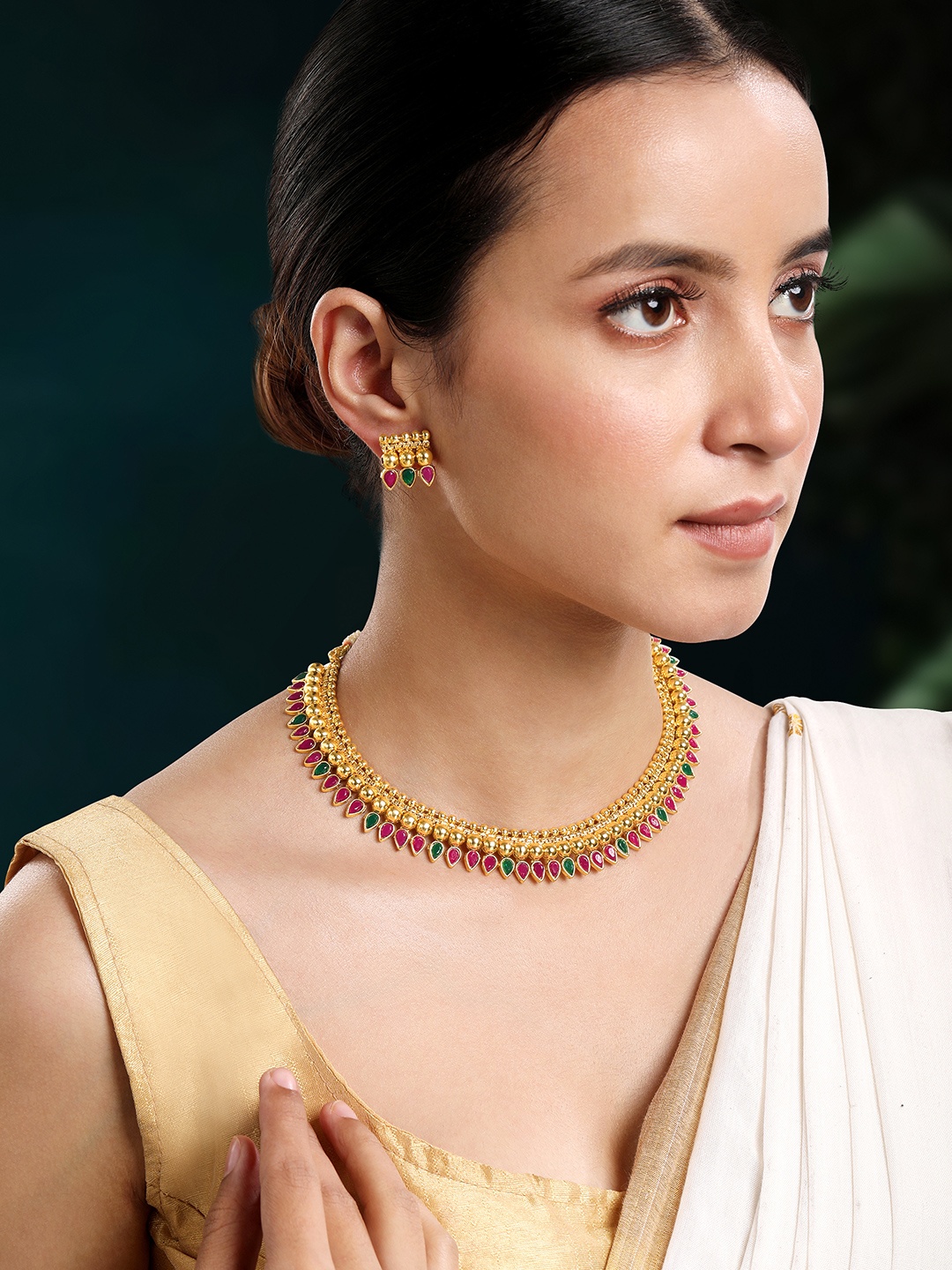 

Peora Gold Plated Stone Studded & Beaded Jewellery Set