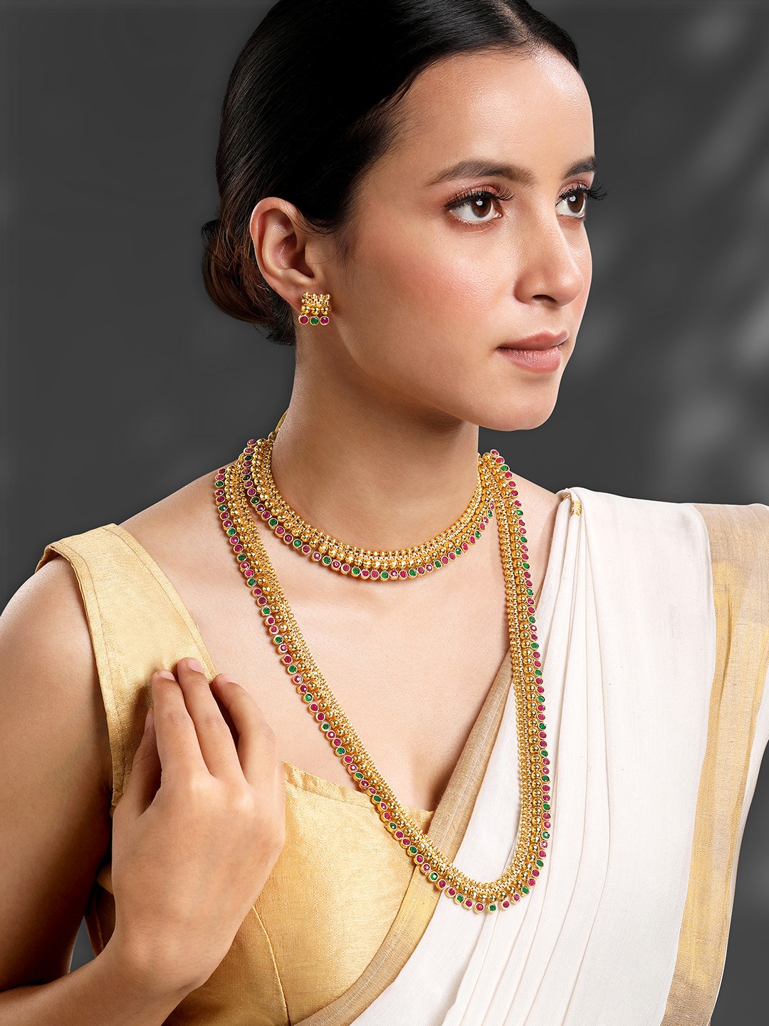 

Peora Gold Plated Stones Studded Choker & Long Necklace Jewellery Set