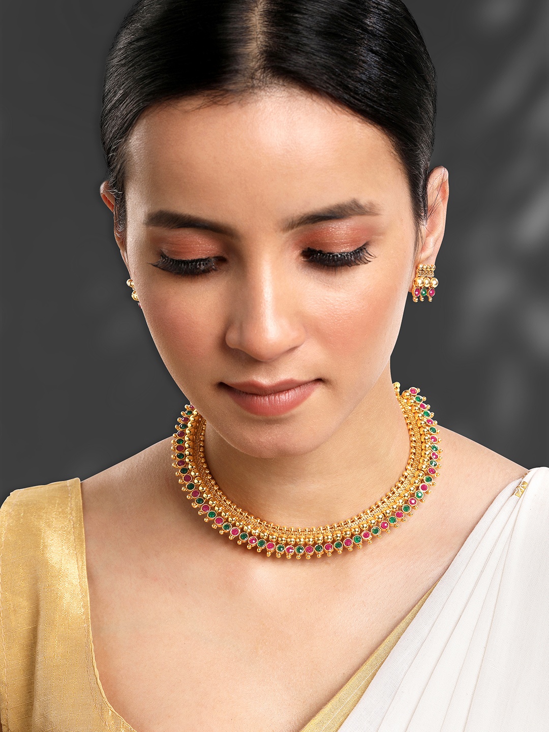 

Peora Gold Plated Stones Studded & Beaded Jewellery Set