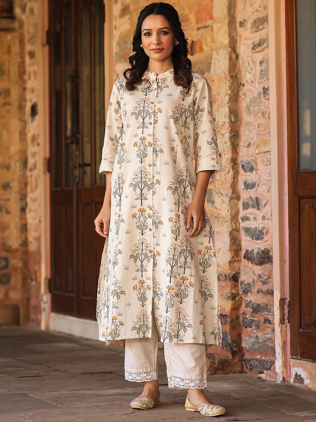 

AMIRAS INDIAN ETHNIC WEAR Floral Printed A-Line Kurta, Mustard