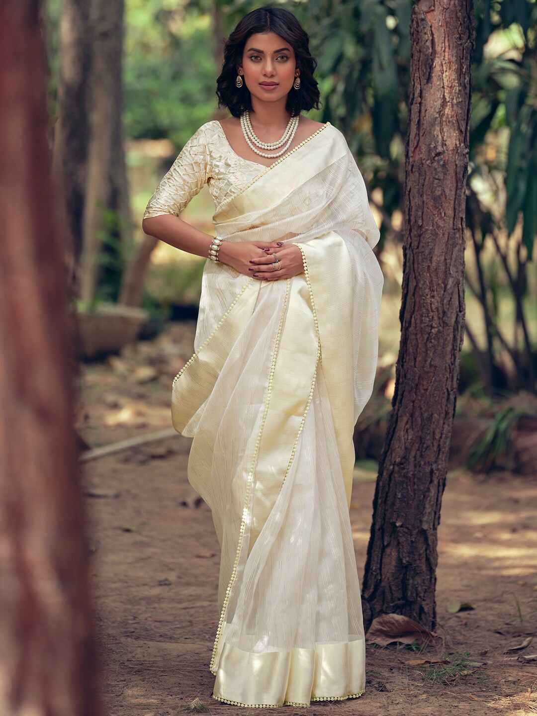 

Stylee LIFESTYLE Woven Design Zari Organza Saree, Cream