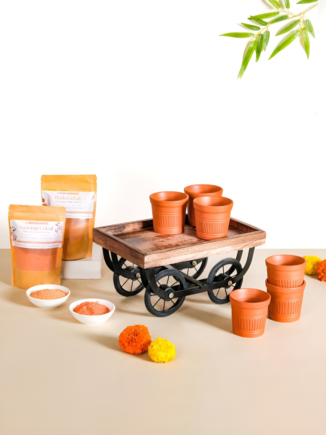 

Nestasia 6-Pcs Brown Kulhad With Cart & 2-Pack Organic Colors Holi Gift Set