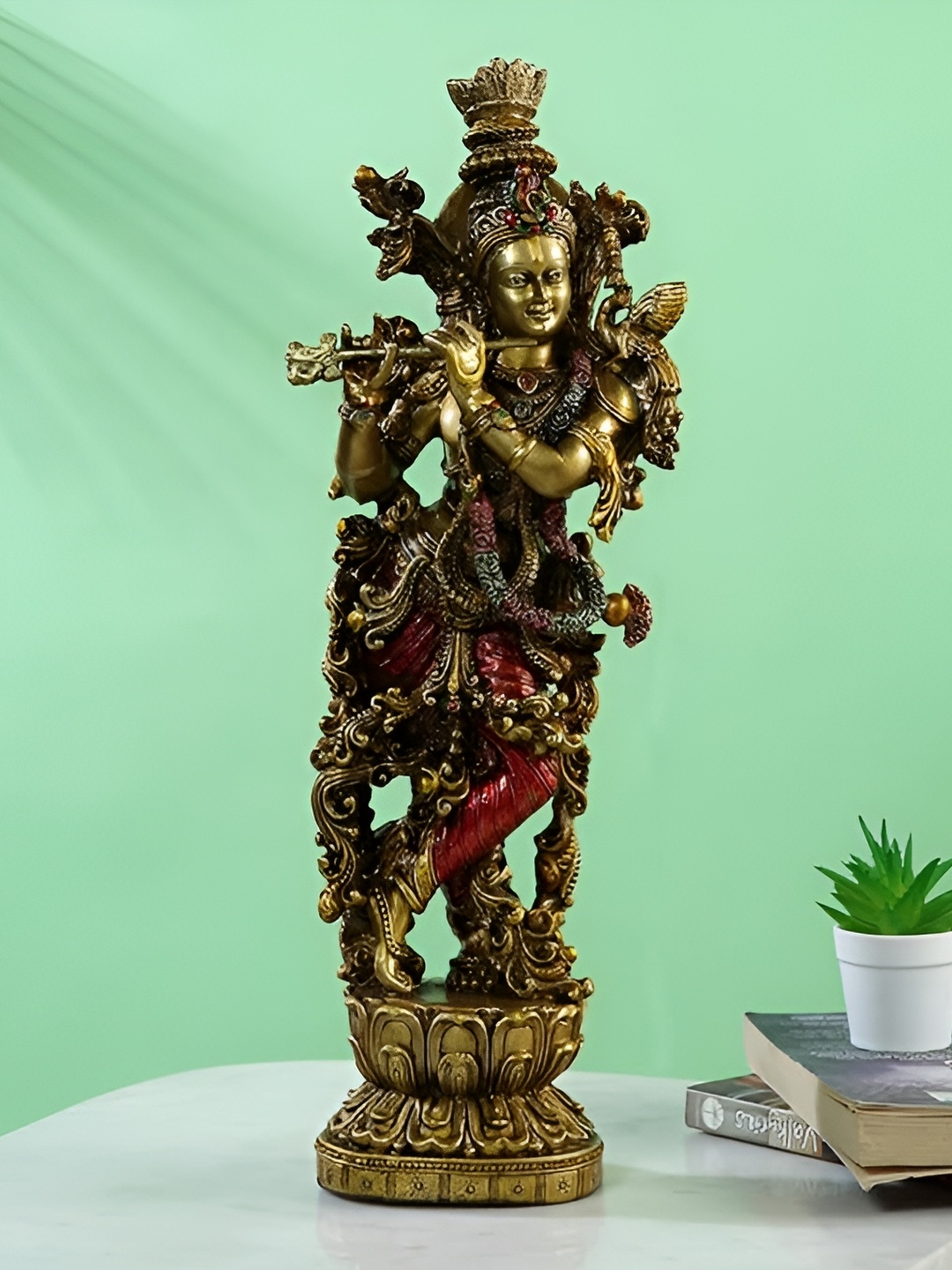 

CraftVatika Gold Toned & Red Krishna Religious Idol Showpiece
