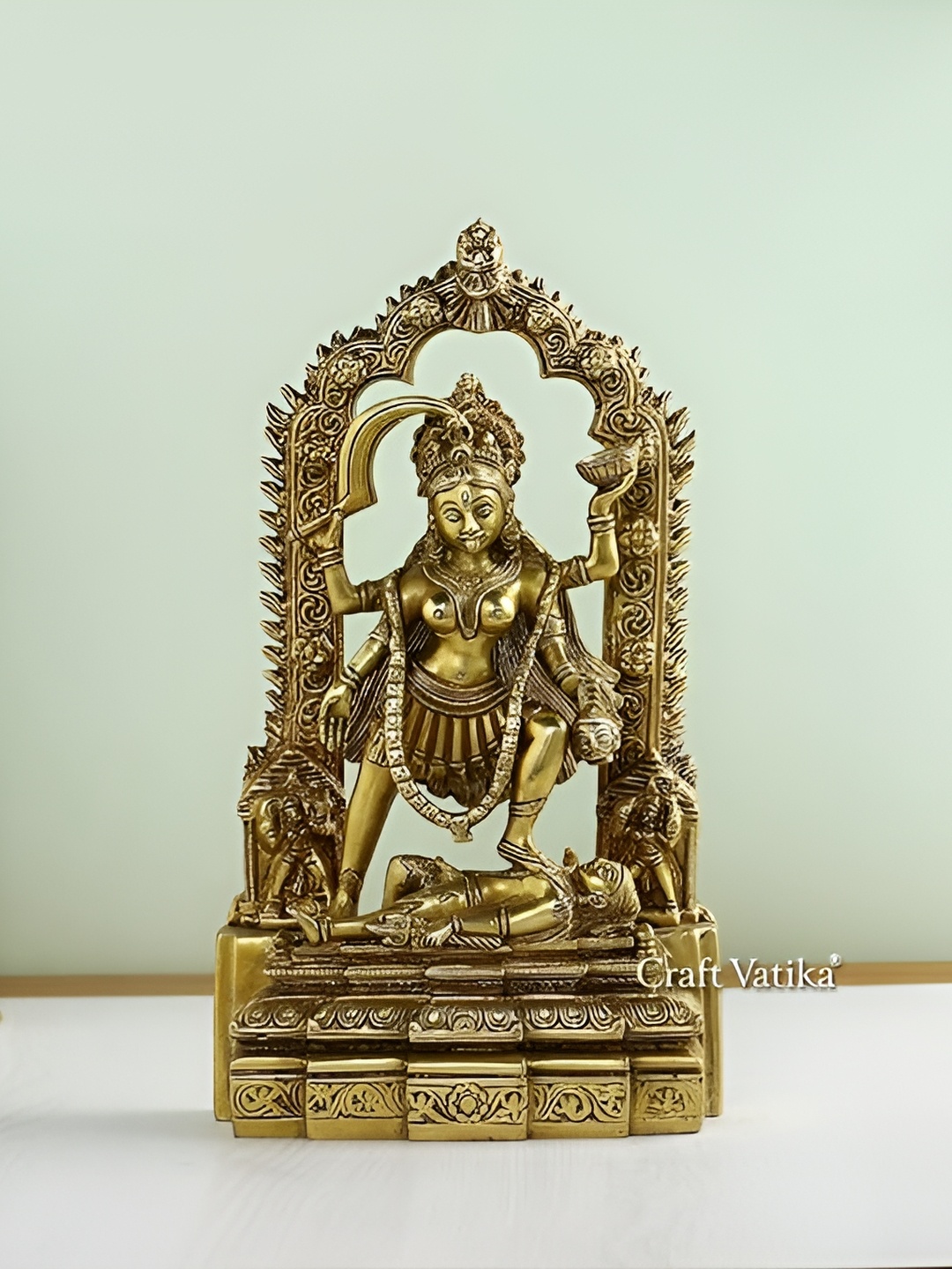 

CraftVatika Gold-Toned Maa Kali Devi Brass Religious Idol Showpiece