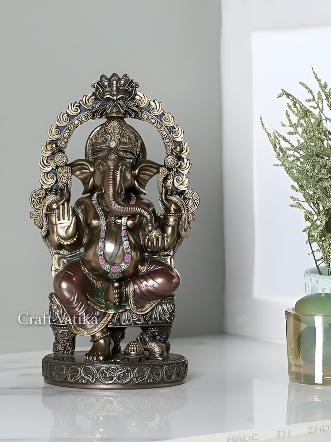 

CraftVatika Copper Toned Ganesha Religious Idol Showpiece