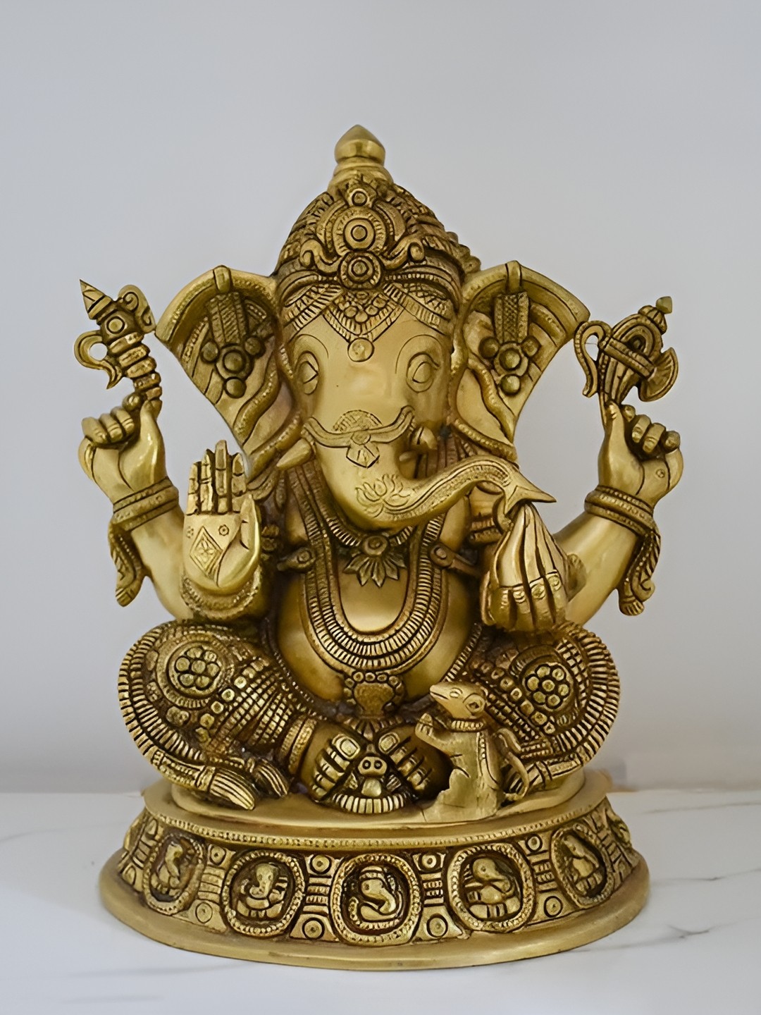 

CraftVatika Gold Toned Brass Ganesha Religious Idol Showpiece