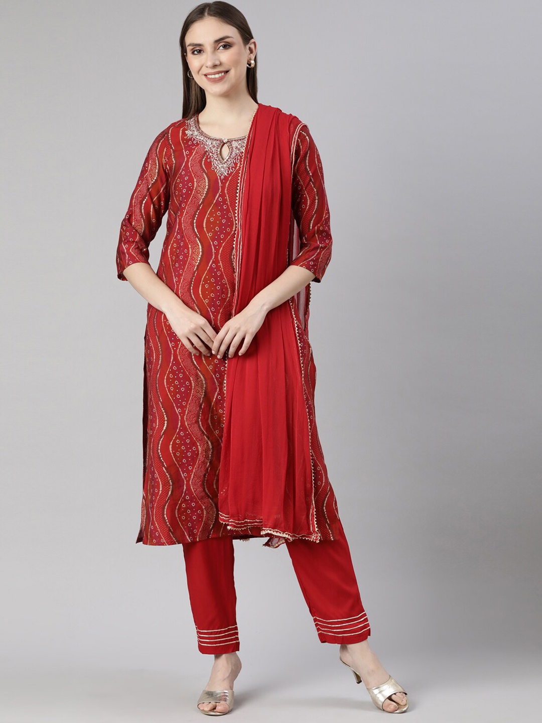 

Neerus Bandhani Printed Regular Beads and Stones Straight Kurta with Palazzos & Dupatta, Red