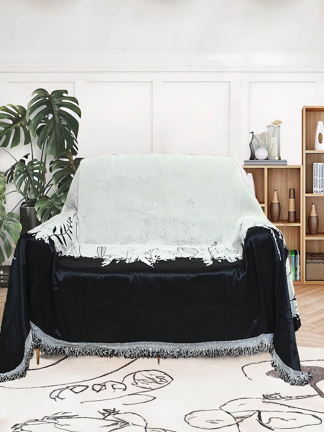 

Cortina Black & White Printed Reversible 1 Seater Sofa Cover Blanket