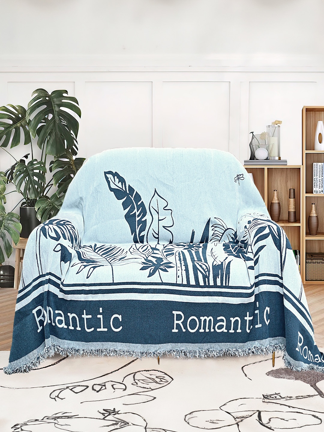 

Cortina Blue & White Printed Reversible Sofa Cover