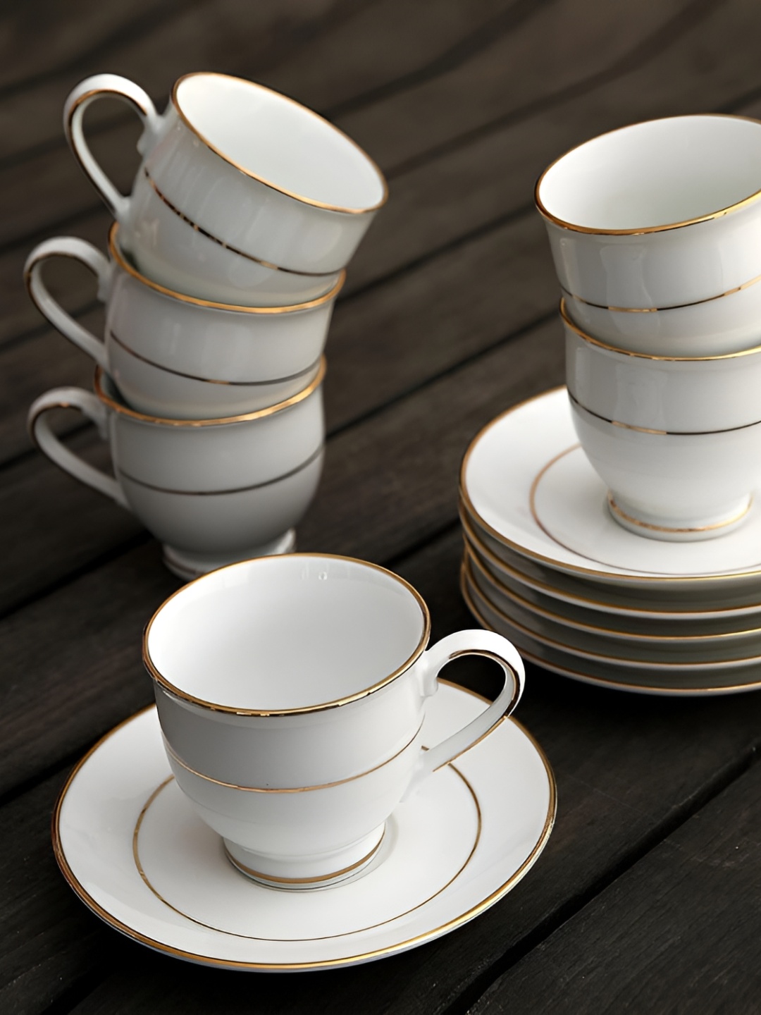 

Hitkari White & Gold Toned 12 Pieces Porcelain Glossy Cups and Saucers Set