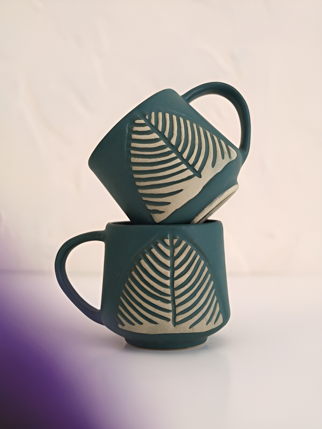 

NURTURE INDIA Teal & Beige 2 Pieces Textured Ceramic Matte Cups 300 ml