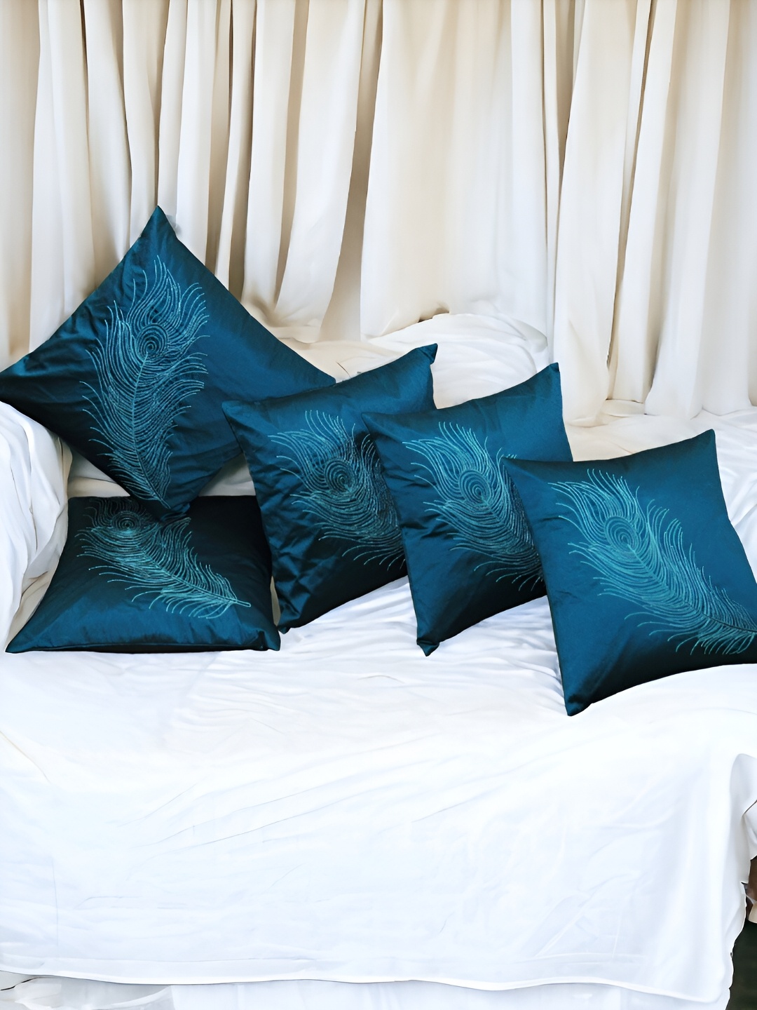 

Zikrak Exim Turquoise Blue & White 5 Pieces Embroidered Satin Square Cushion Covers