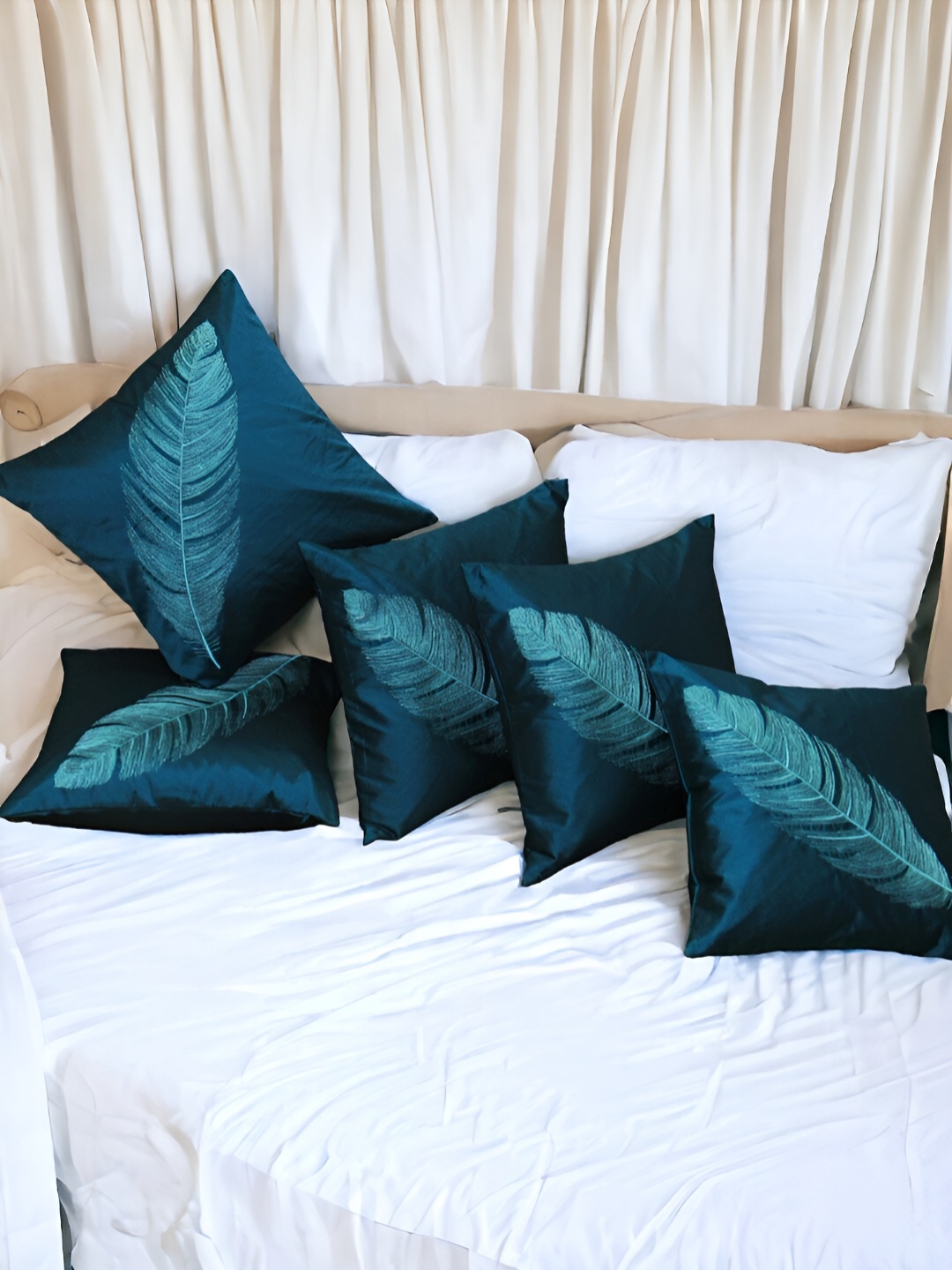 

Zikrak Exim Turquoise Blue & White 5 Pieces Embroidered Satin Square Cushion Covers