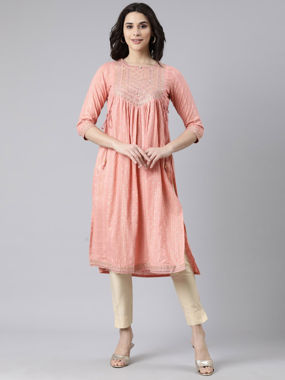 

Neerus Yoke Design Sequinned Pleated Straight Kurta, Peach