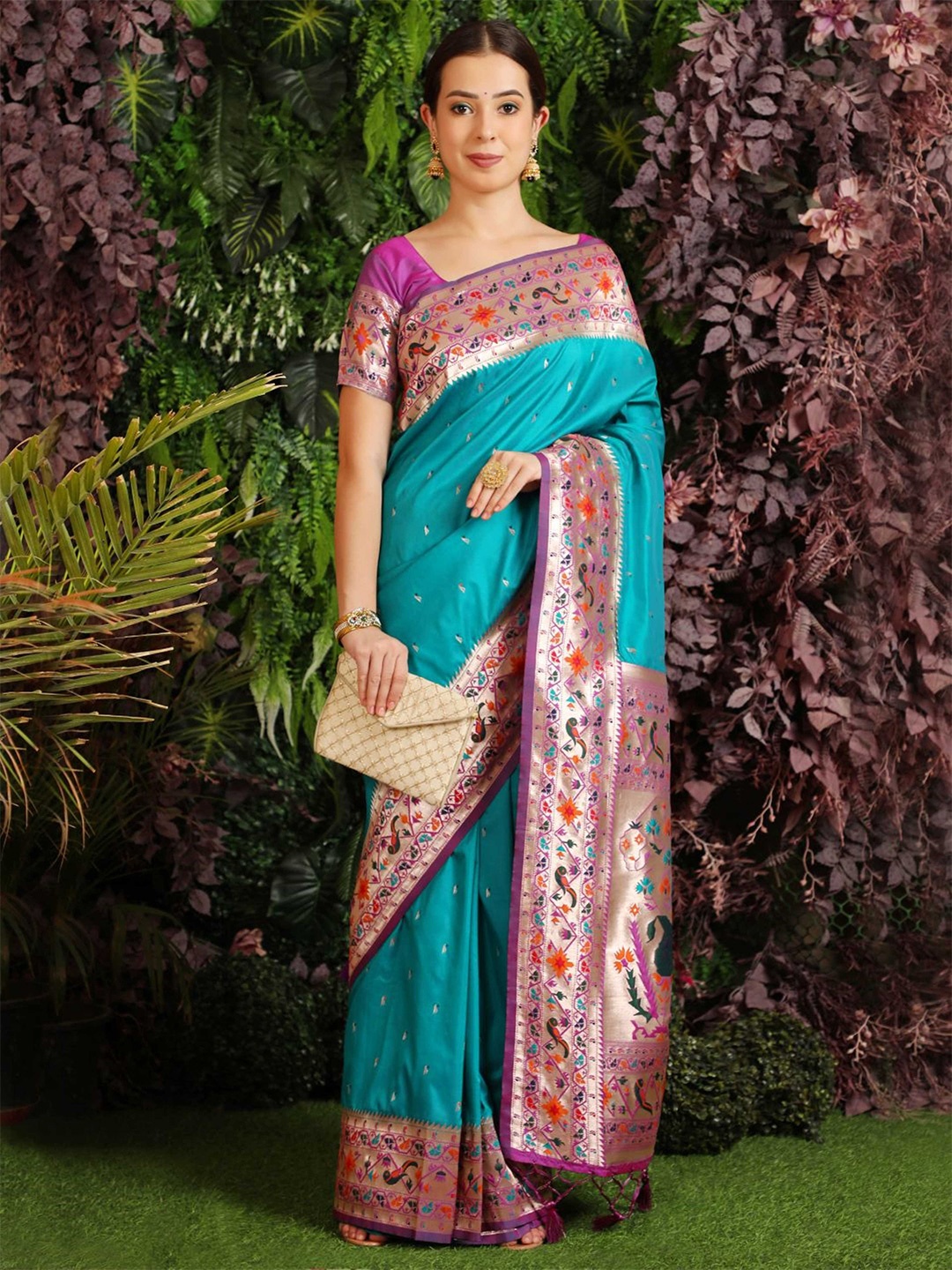 

Mitera Teal Blue Ethnic Motifs Woven Design Zari Paithani Saree