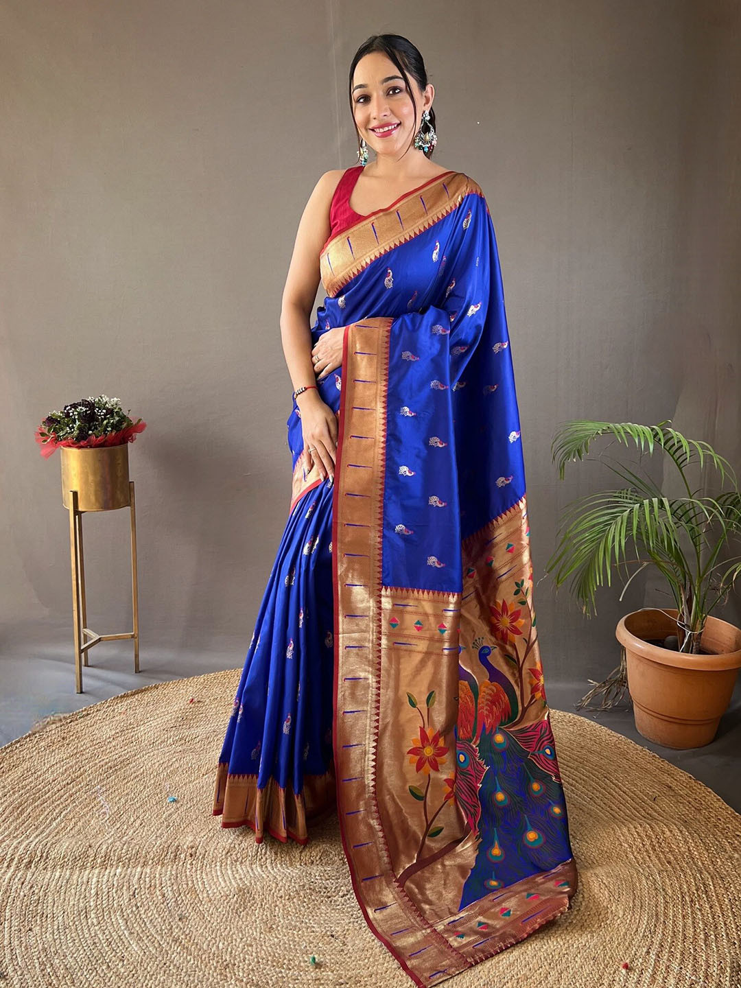 

Mitera Ethnic Motifs Woven Design Zari Paithani Saree, Blue
