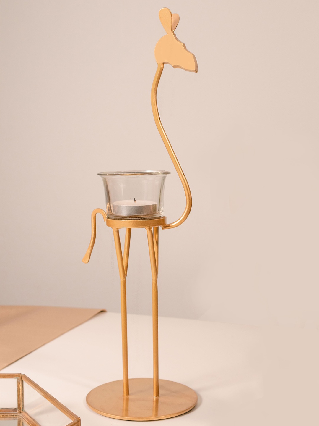 

Chokhat Gold Toned Giraffe T-Light Candle Holder