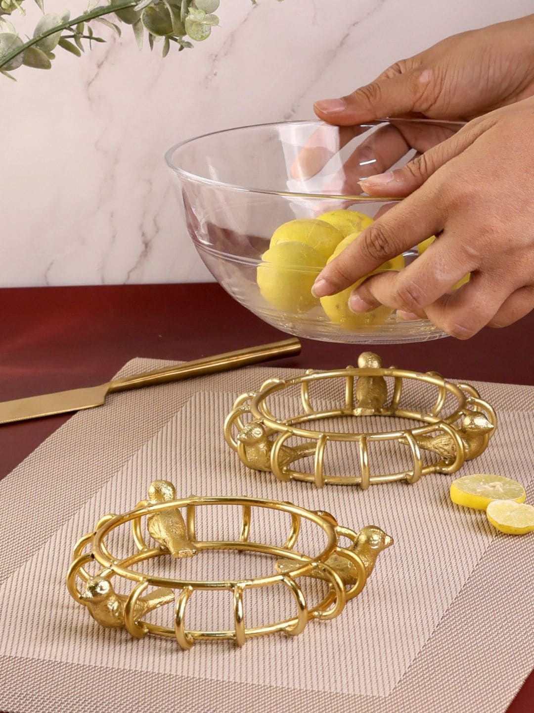 

Chokhat Gold Toned Glossy Finish Metal Trivet
