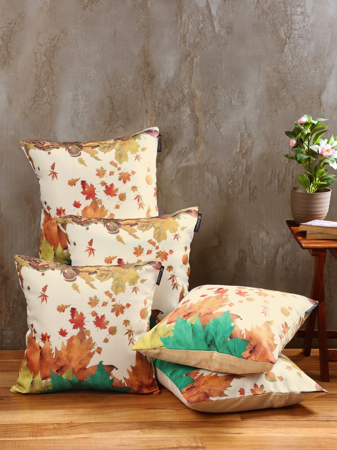 

Aura Beige & Orange 5 Pieces Floral Printed Jute Cotton Square Cushion Covers