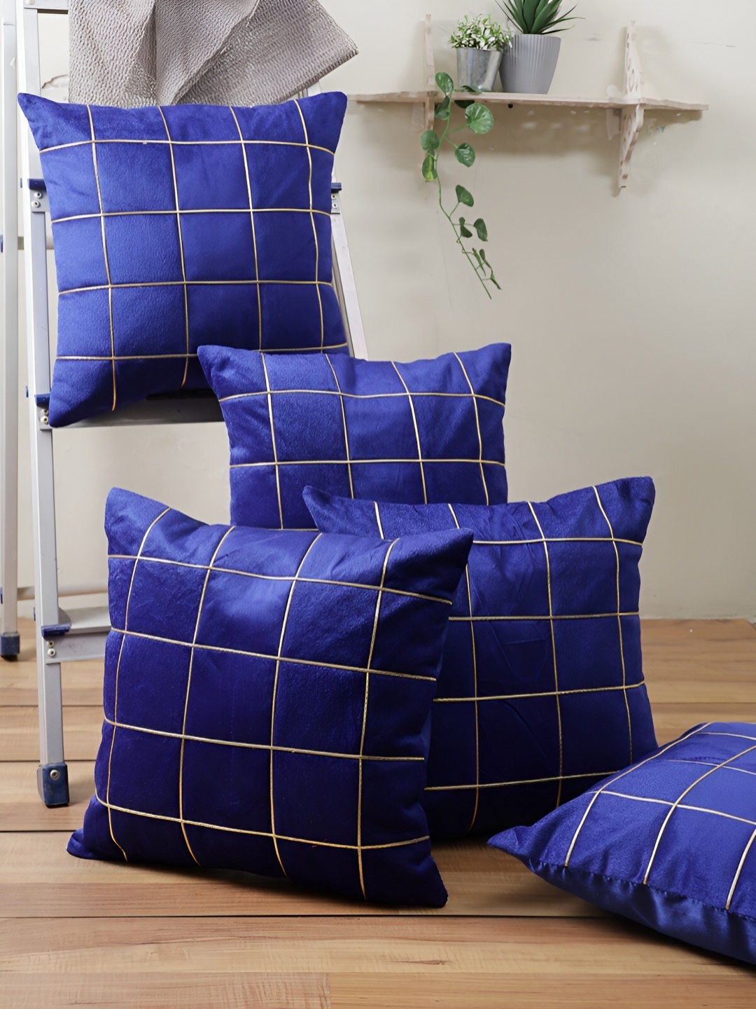 

Aura Blue & Gold Toned 5 Pieces Checked Square Cushion Covers