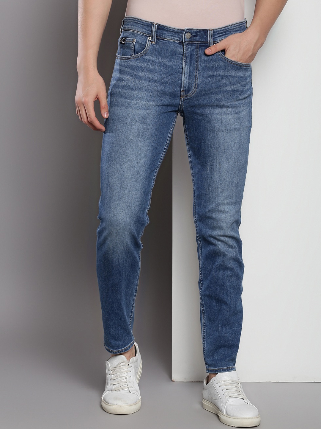 

Calvin Klein Men Clean Look Light Fade Jeans, Blue