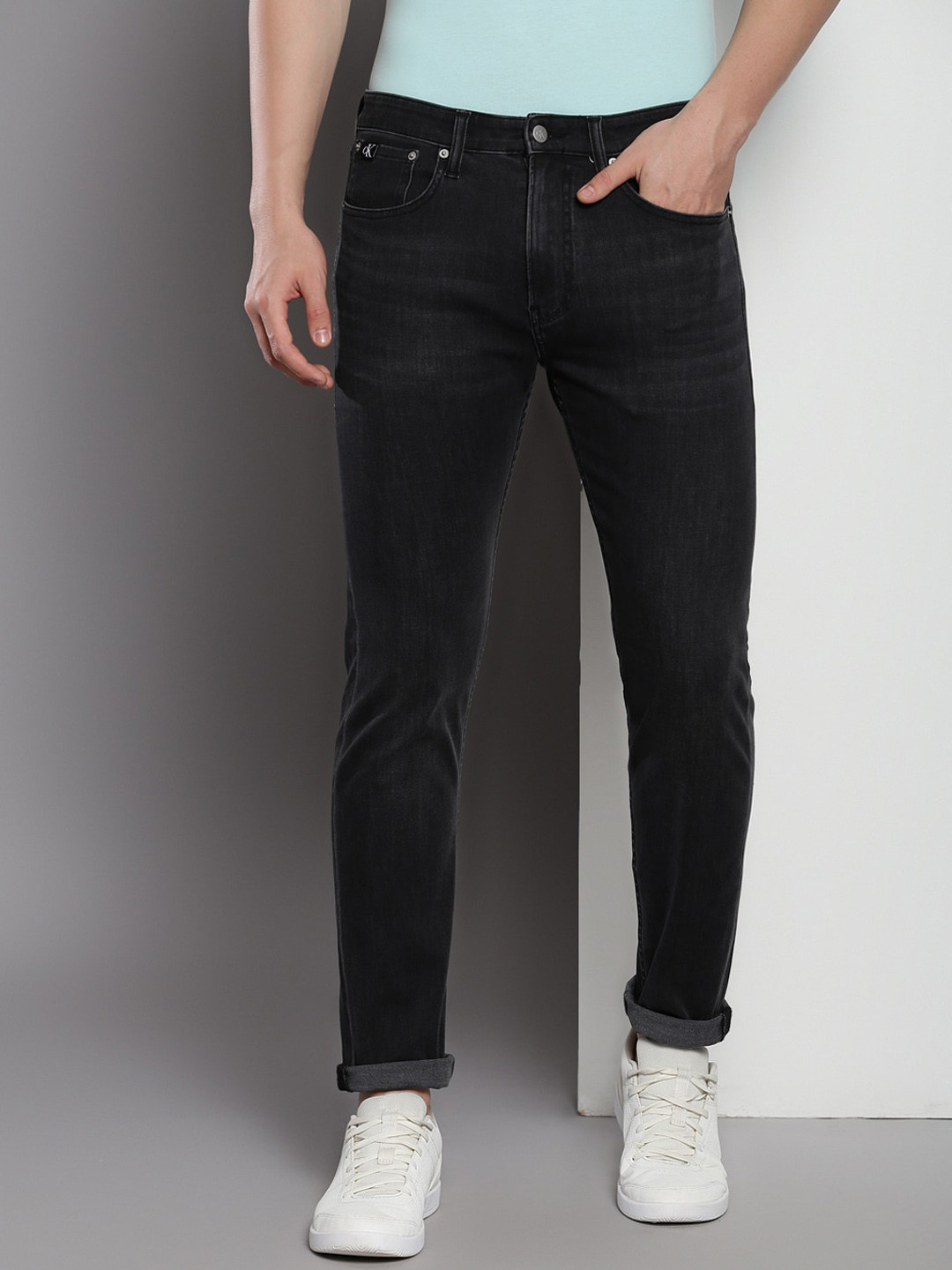 

Calvin Klein Men Tapered Fit Light Fade Jeans, Black